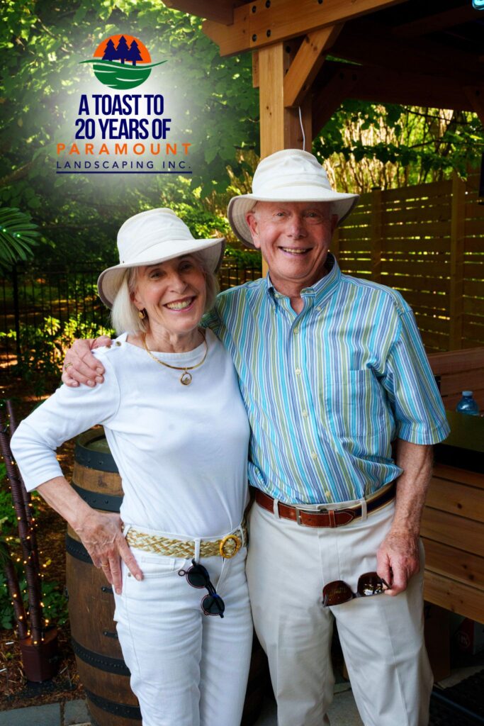 Long-time residential clients of Paramount Landscaping near the bar and firepit lounge during the 20th Anniversary Celebration.