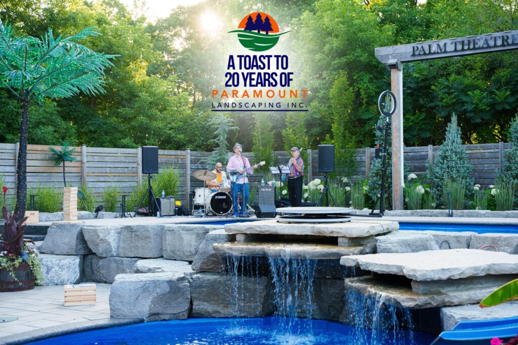 Waterfall feature between the two pools at Paramount's Discovery Lounge, with the band playing in the background during the 20th Anniversary event.