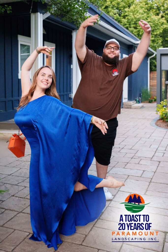Melissa Rolston and Andrew ElLithy strike a playful ballet pose during Paramount Landscaping's 20th Anniversary celebration.