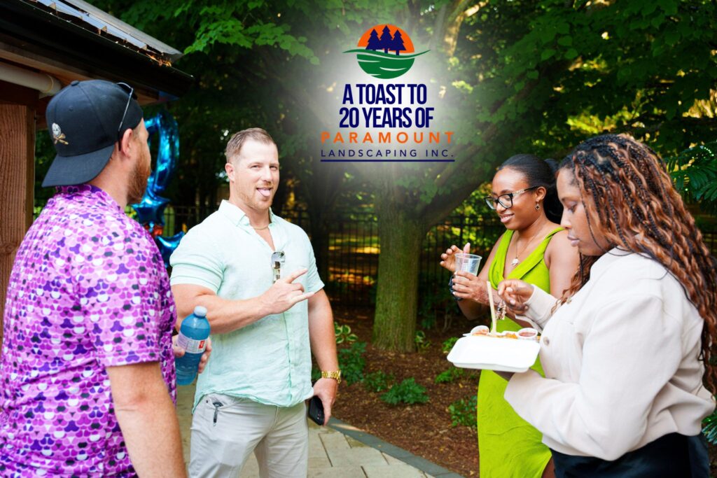 Digital21 founder Cale and team member chatting with Dana and Shenelle at the Paramount Landscaping 20th Anniversary.