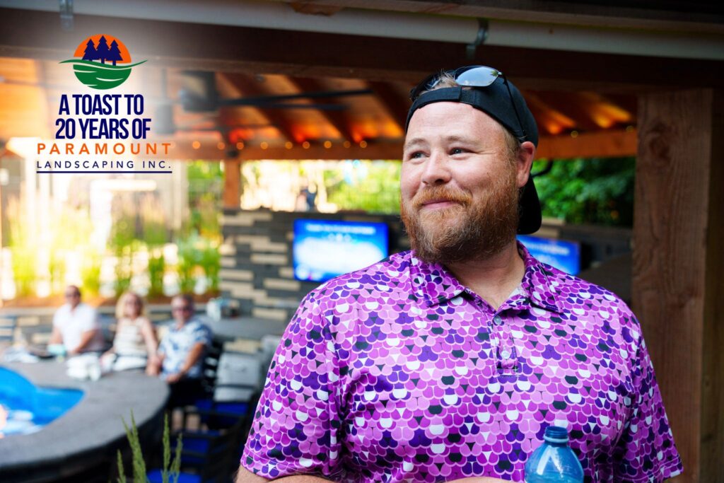 Digital21 employee enjoying Paramount Landscaping’s 20th Anniversary celebration, captured in the Discovery Lounge.