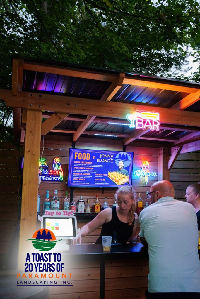 Doug Dolson at the Paramount Landscaping 20th Anniversary event with bartenders from Two Hot Blondes Bartending Services at the Jonny Blonde Food Truck.