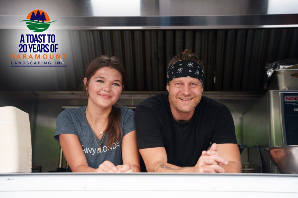 Jonny Blonde Food Truck team serving guests at Paramount Landscaping’s 20th Anniversary celebration.