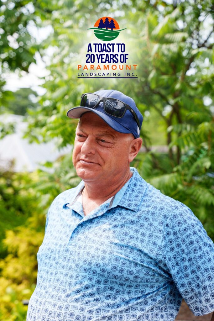 Russ, owner of Legends Landscape Supply, standing outdoors at the Paramount Landscaping 20th Anniversary event.