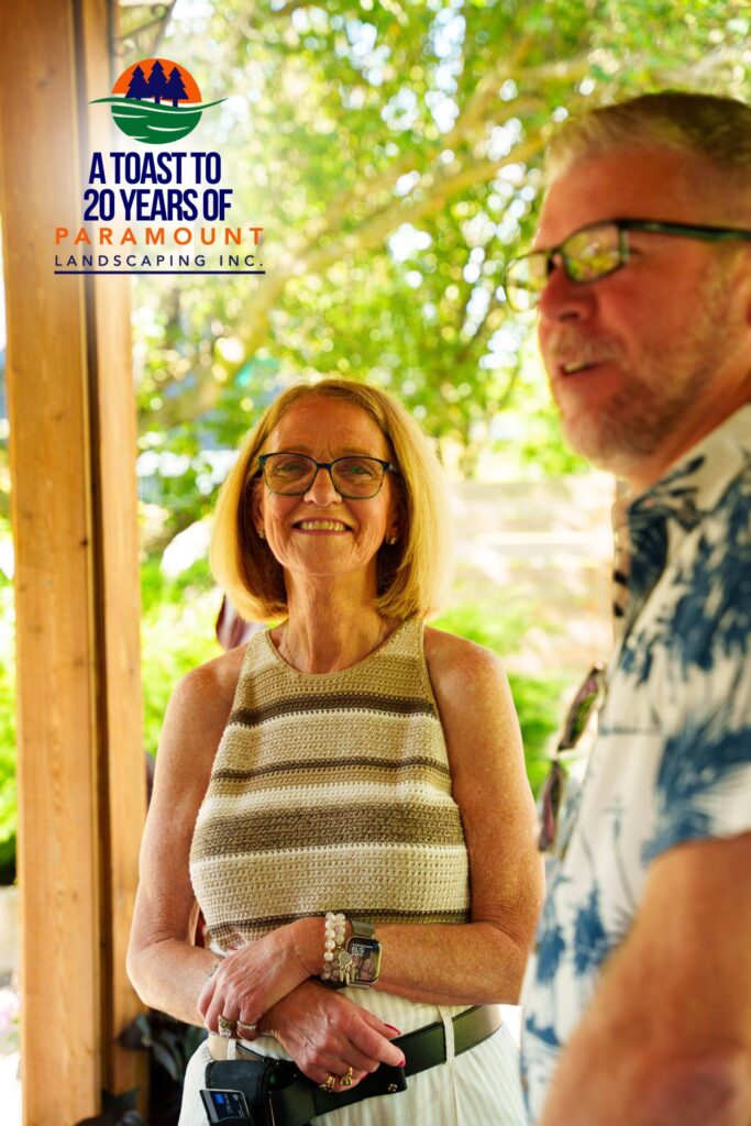 Peggi Shepherd DeGroote and her husband Michael smiling together at Paramount Landscaping’s 20th Anniversary celebration.