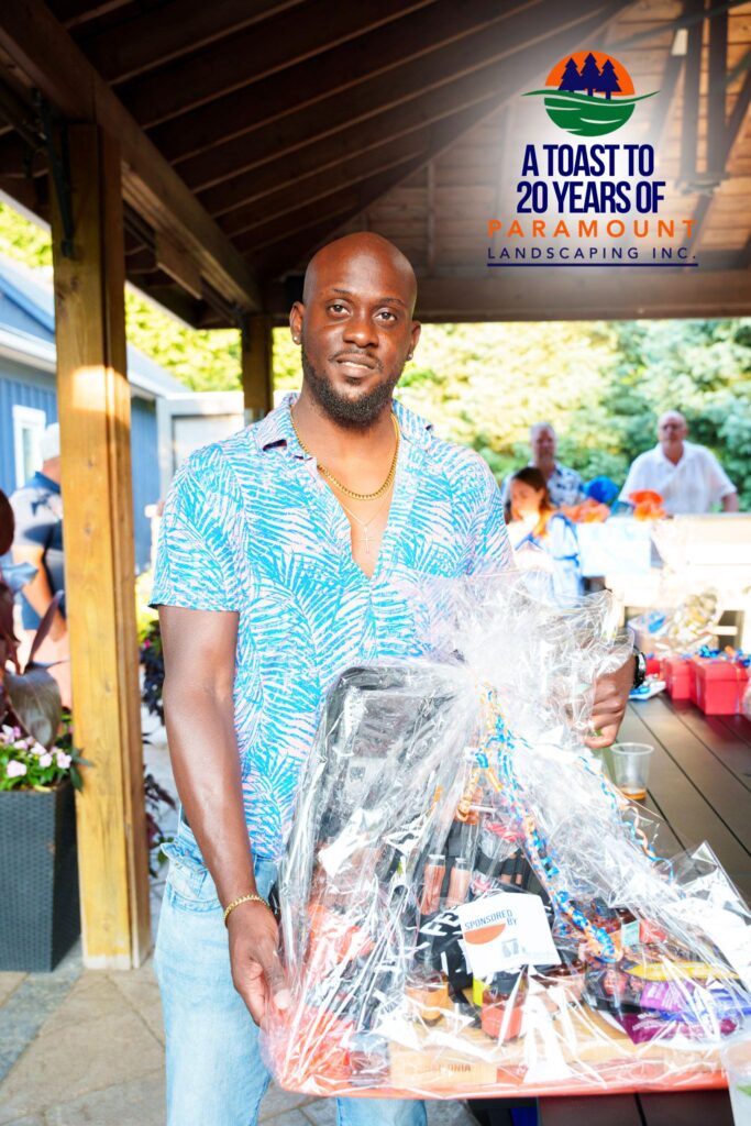 Anthony from Red Berry Group at Paramount Landscaping’s 20th Anniversary Celebration, representing a valued commercial client partnership.