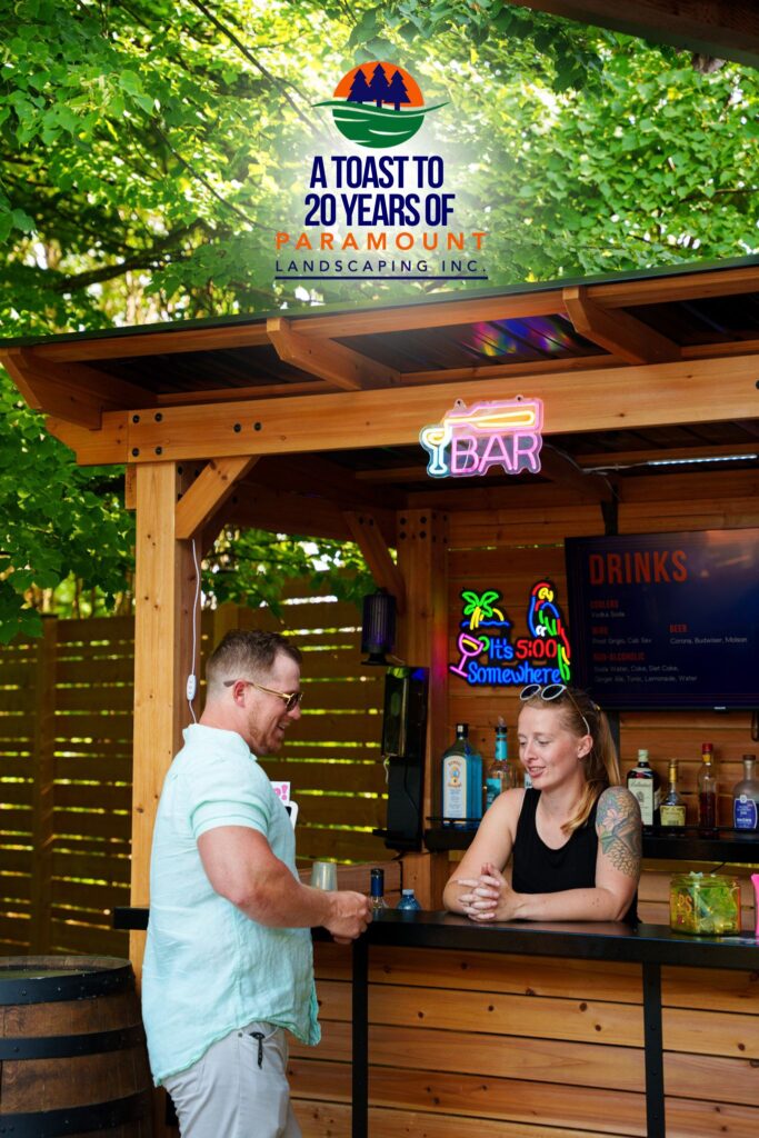 Cale from Digital21 chats with a bartender from Two Hot Blondes Bartending Services at Paramount Landscaping’s 20th Anniversary event.